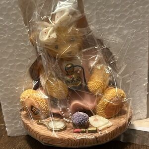 Cherished Teddies yellow and cream figurine with pink dress